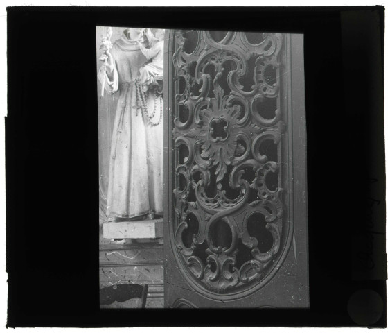 Église d'Acquigny (Eure), panneau en bois sculpté.