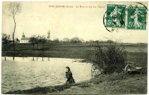 Bois-Jérôme-Saint-Ouen. La Mare et vue sur L'Eglise.