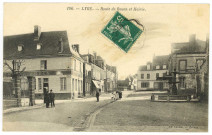 Neuve-Lyre (La). Route de Rouen et Mairie.
