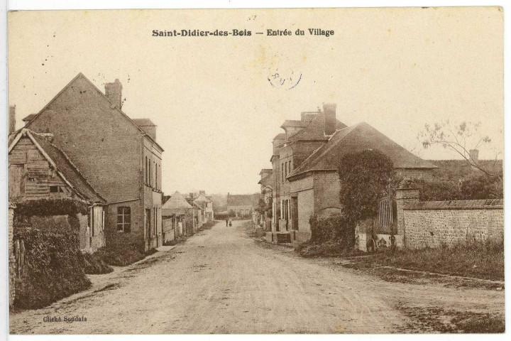Saint-Didier-des-Bois. Entrée du Village.