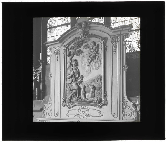 Tableau en bois sculpté représentant Saint-Roch.