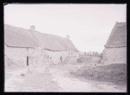Chaumière bretonne, puits et paysan avec son cheval.