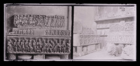 Ruines et vestiges d'abbaye, morceaux de retables en pierre délabrés posés sur un mur.