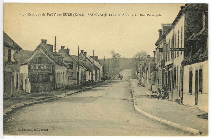 Saint-Aquilin-de-Pacy. La Rue Principale.