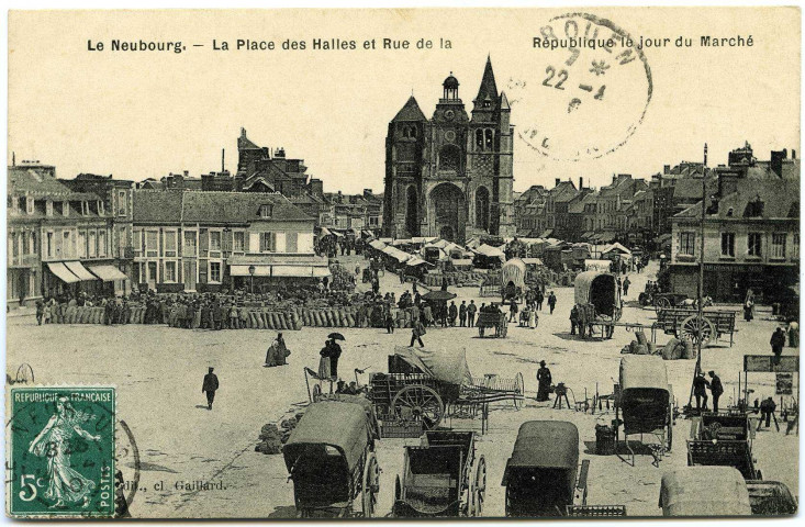 Neubourg (Le). La Place des Halles et Rue de la République le jour du Marché.