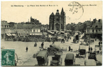 Neubourg (Le). La Place des Halles et Rue de la République le jour du Marché.