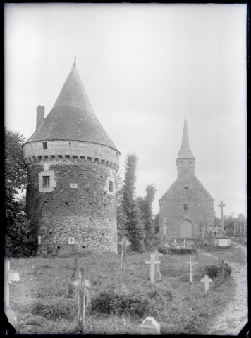 Église et cimetière breton, tour fortifiée.