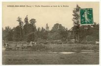 Condé-sur-Risle. Vieille Chaumière au bord de la Rivière.