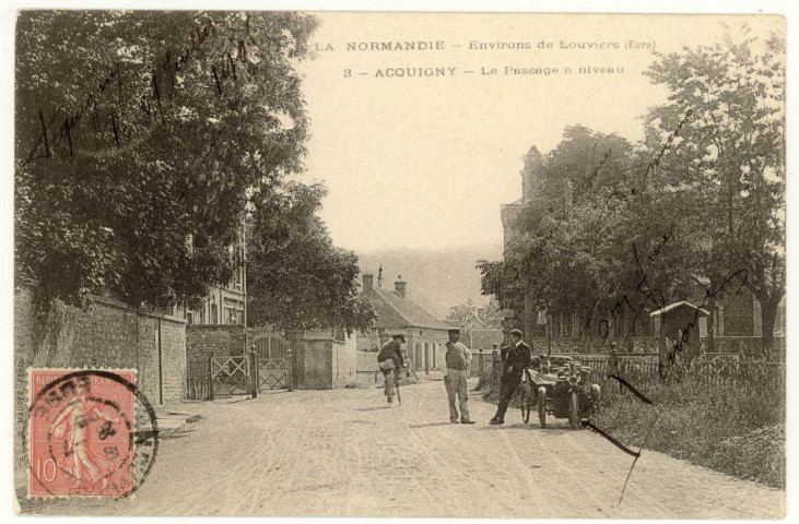 Acquigny. Le passage à niveau.