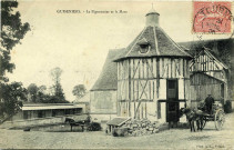 Guiseniers. Le Pigeonnier et la Mare.