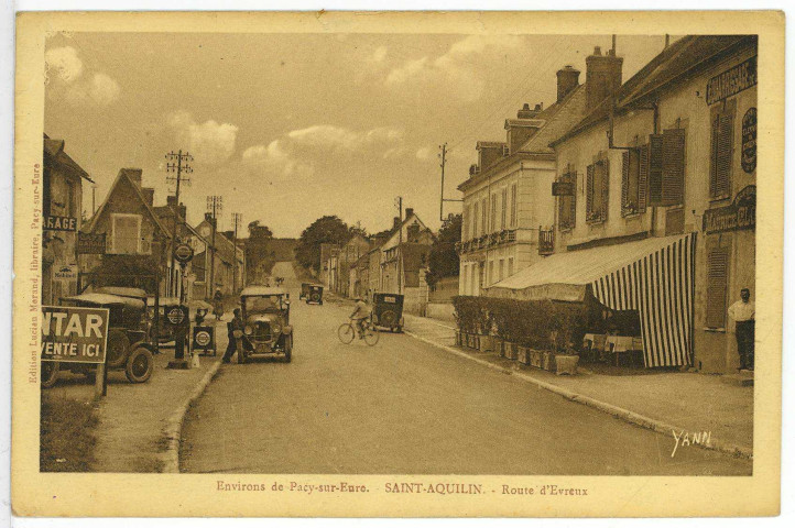 Saint-Aquilin-de-Pacy. Route d'Evreux.