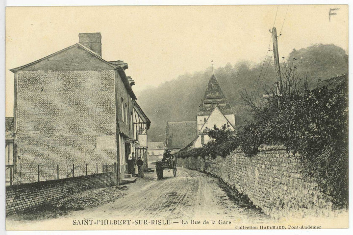 Saint-Philbert-sur-Risle. Rue de la Gare.